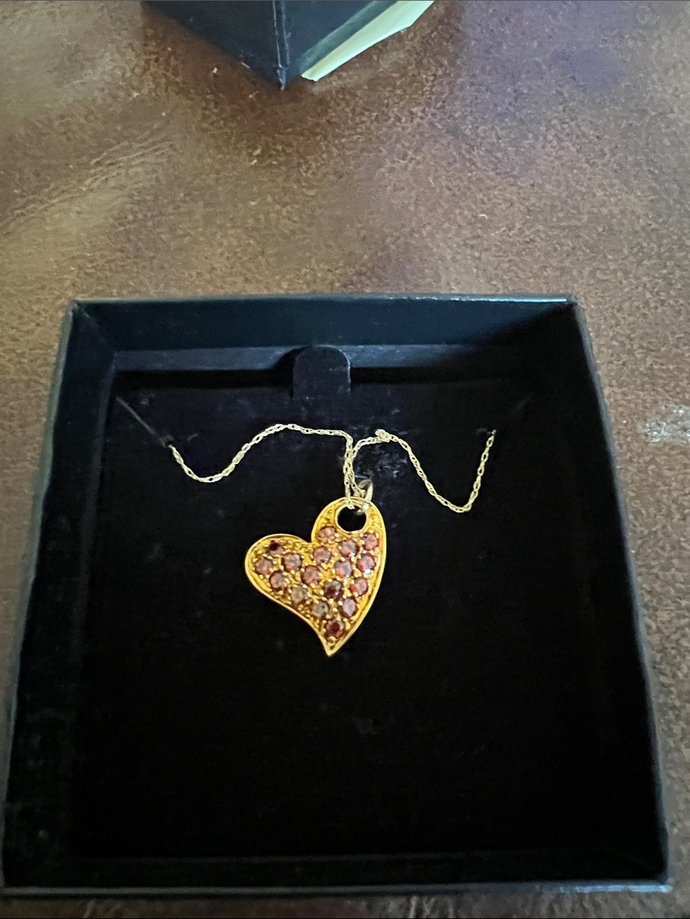 Gold Heart Pendant Necklace with Red Gemstones